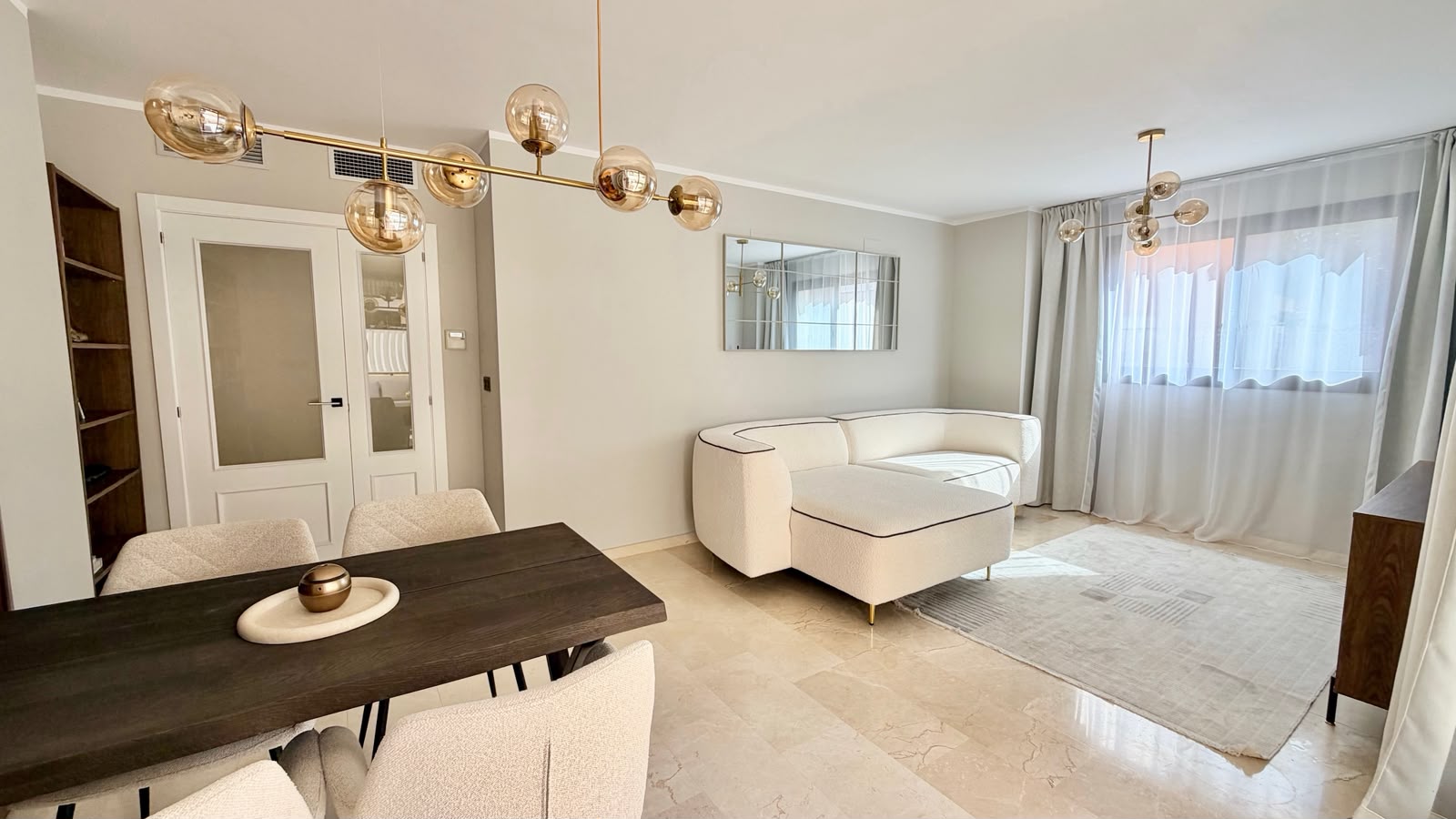 Apartment with a spacious terrace, garage, and storage room near the Port of Javea.