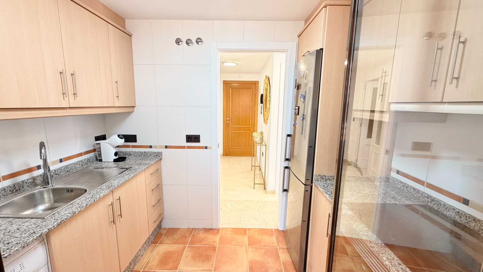 Apartment with a spacious terrace, garage, and storage room near the Port of Javea.